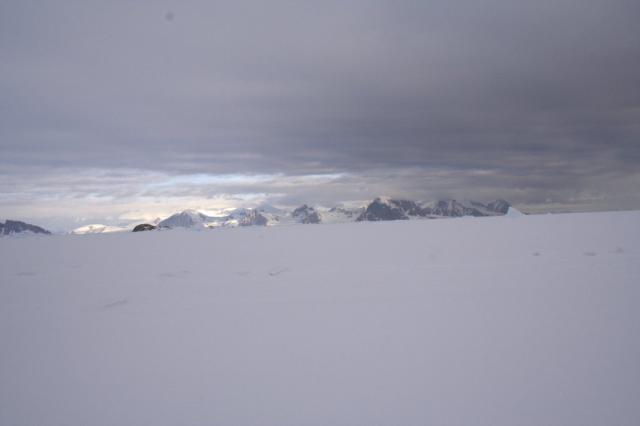 Sea ice and distant mountains